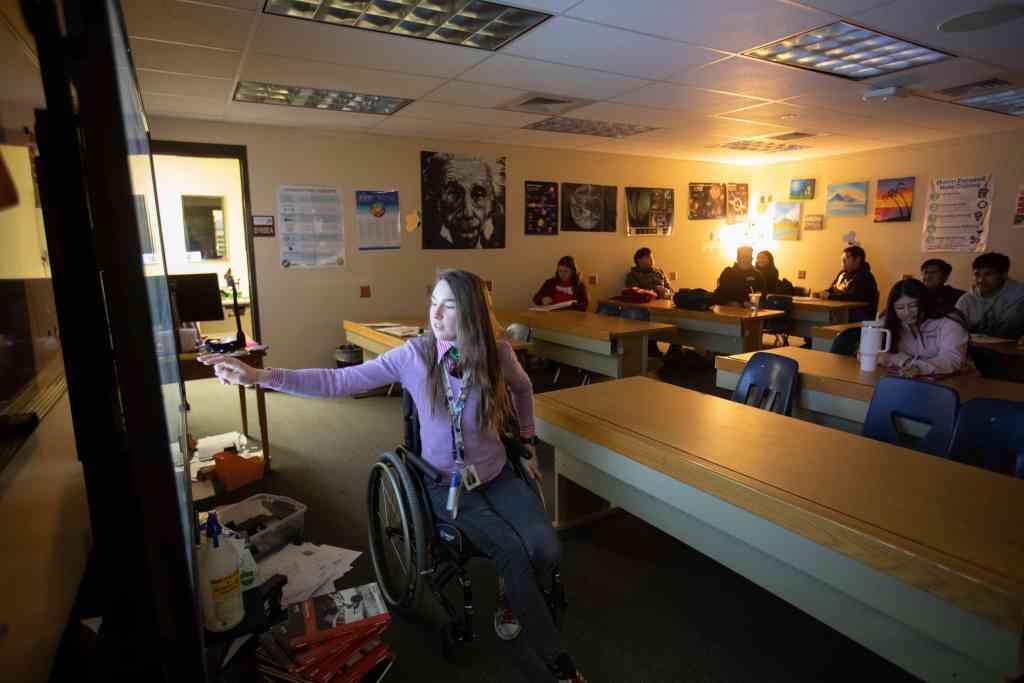 Marcillene Dover now has health insurance as a teacher at Wichita North High School, but she says she also has nearly $10,000 in medical debt.