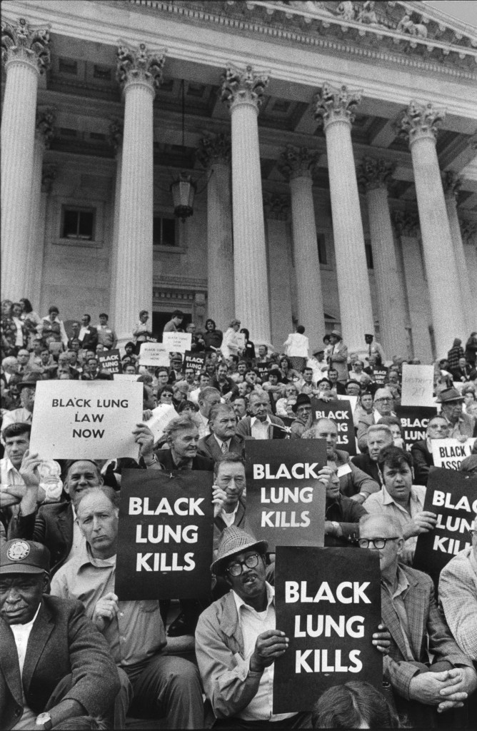 Coal miners protest the persistence of black lung disease at the U.S. Capitol in 1975.