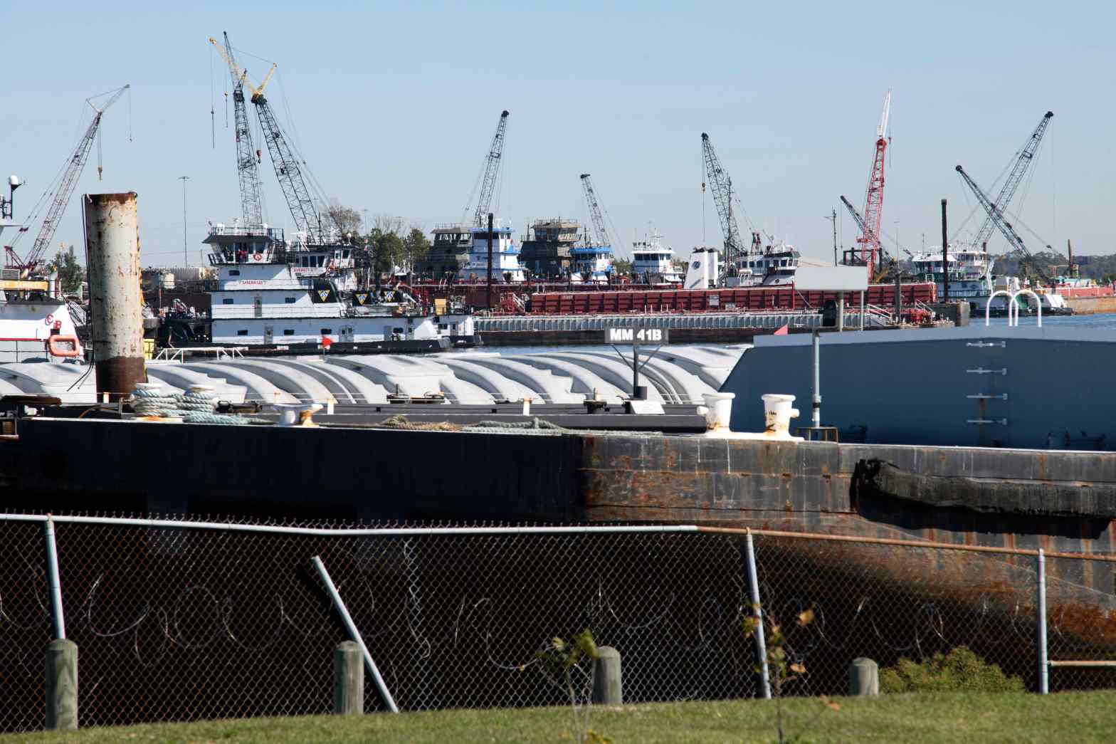 Barges line the San Jacinto River near K-Solv, a chemical distribution facility in Channelview, Texas, east of Houston.