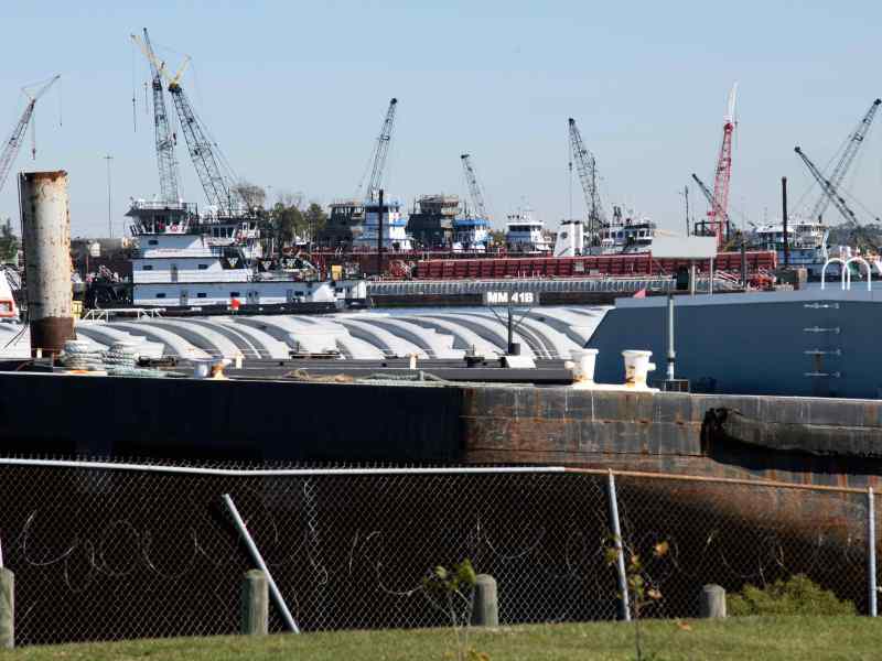Barges line the San Jacinto River near K-Solv, a chemical distribution facility in Channelview, Texas, east of Houston.
