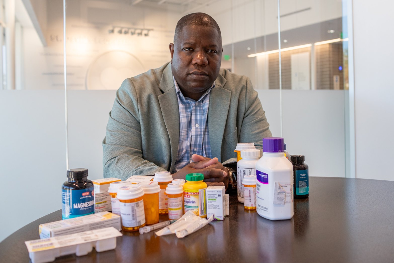 Fred Blackman II a minister in Austin, has to take dozens of pills every day to deal with the pain and complications of a catastrophic back injury. His experience going uninsured turned him into an outspoken advocate for better health care access in Texas.