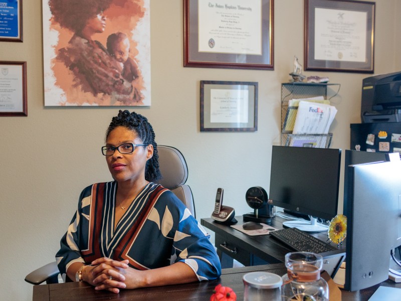 Kimberly Sennett poses for a photo in her home office on Aug. 15, 2026.